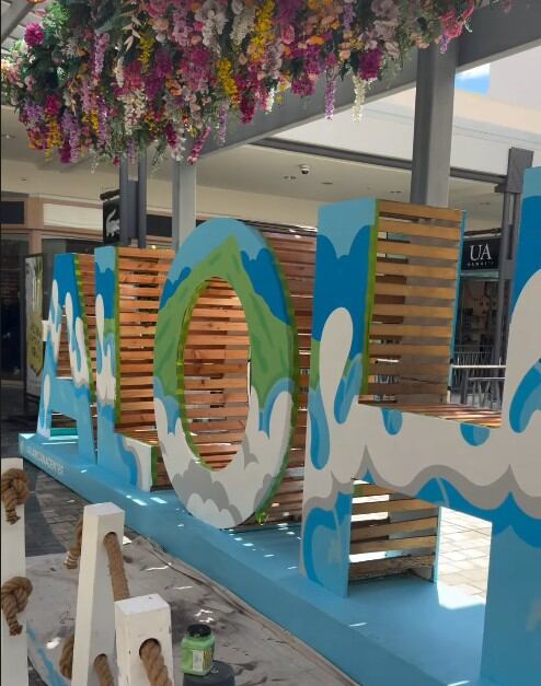 Meet the artist behind Ala Moana’s wave-inspired Aloha mural